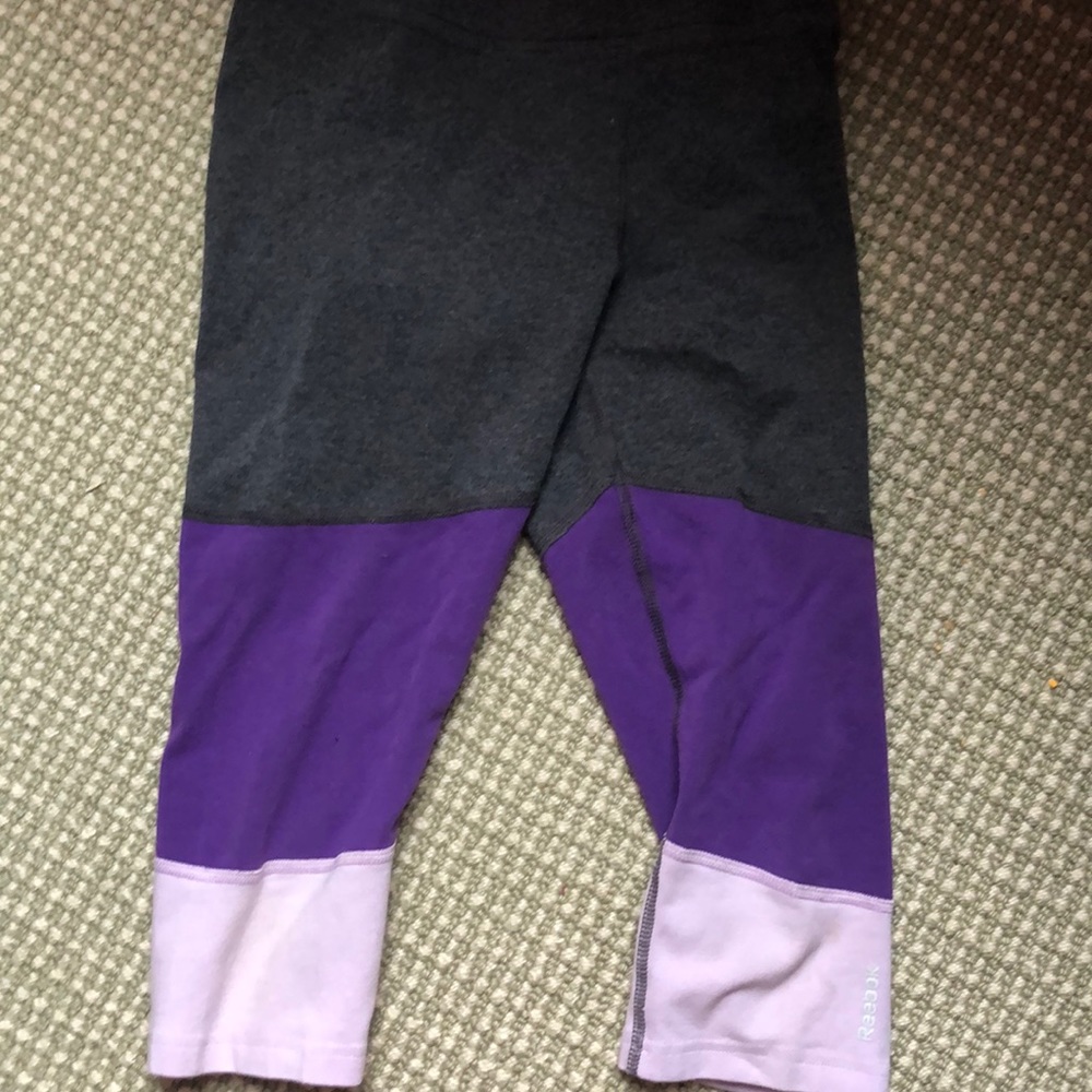 These are a pair of Reebok Capri pants.